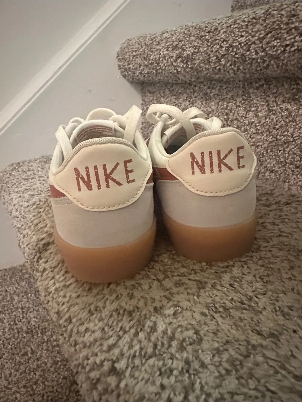 Nike White Leather Low-Top Sneaker with Rust Swoosh